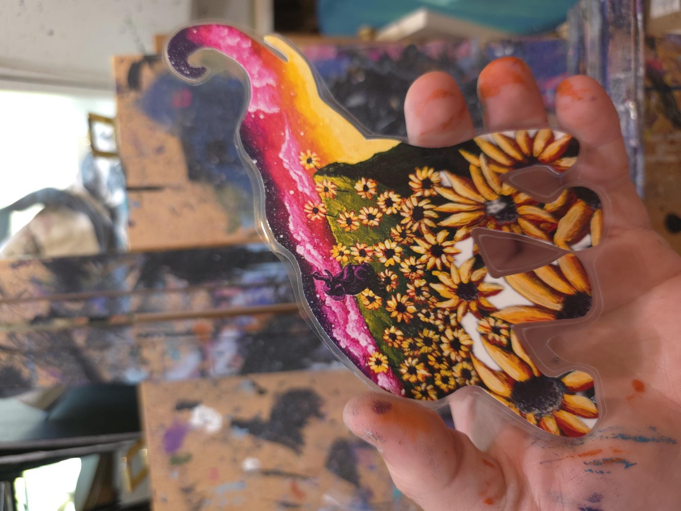 Bird-shaped die-cut print with orange, pink, and yellow floral pattern details